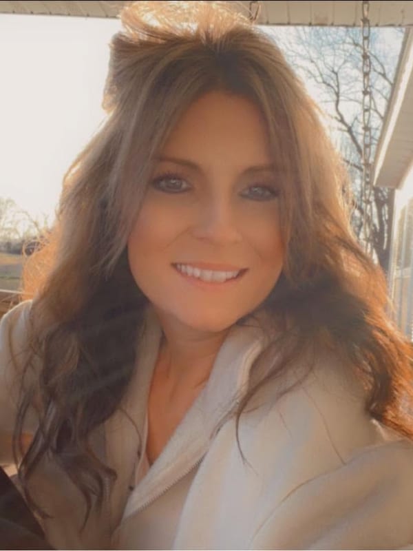 The founder of Graceful Glow Wick Co.